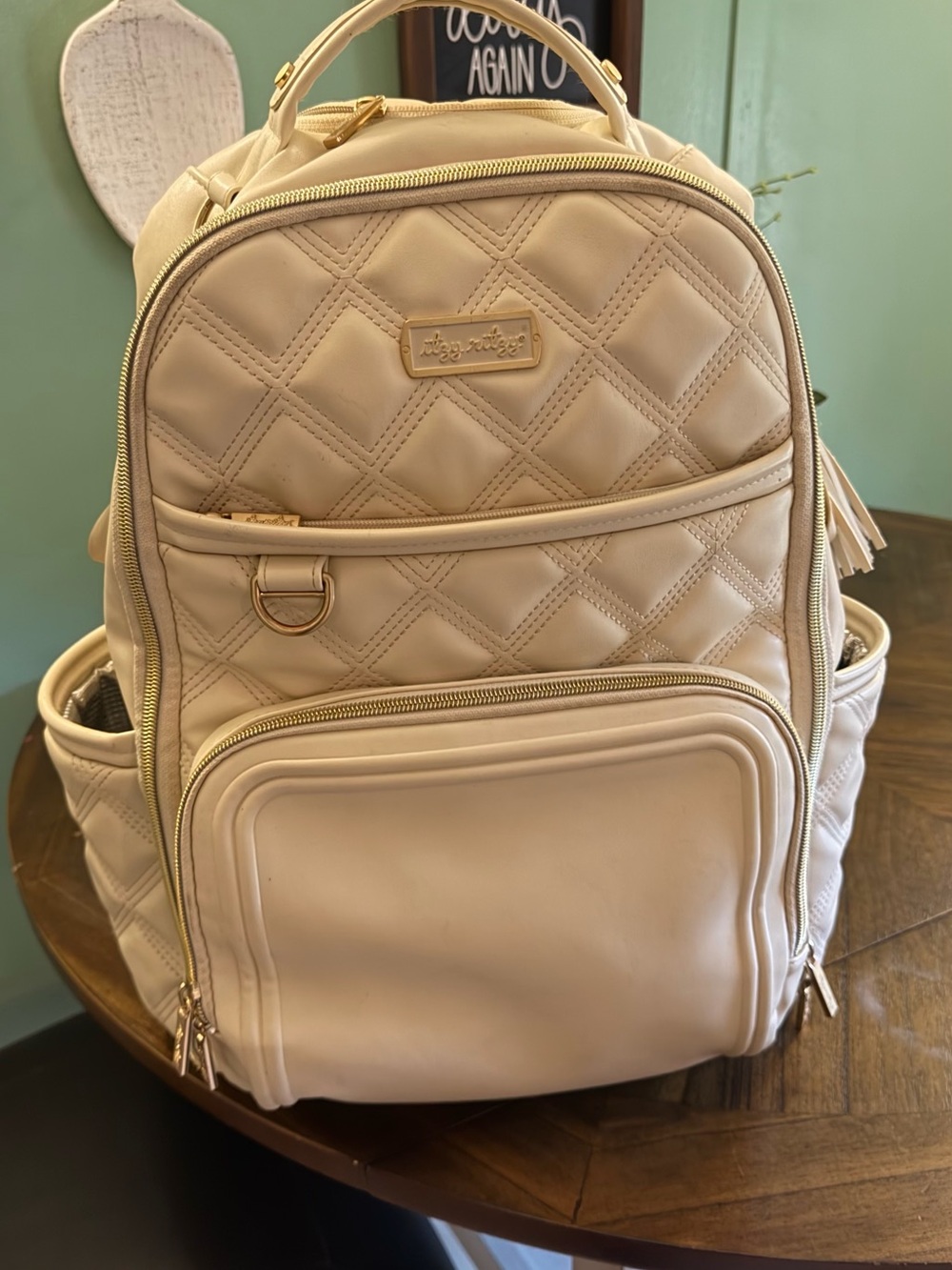 Itzy Ritzy Quilted Cream Backpack Diaper Bag